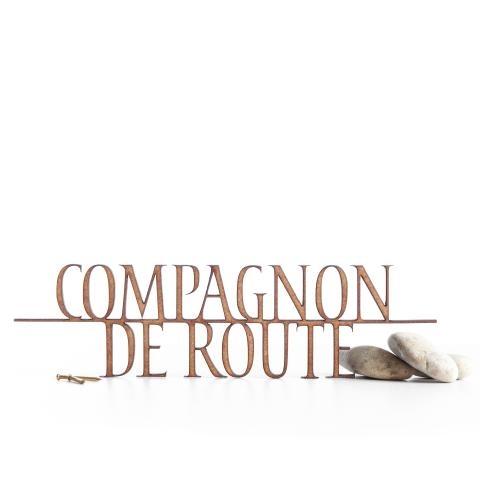 Mini muurtekst 'Compagnon de route'